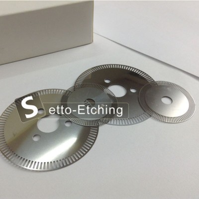 Chemical etching metal filter disk manufacture